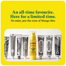 Mango Bite Inspired Toothpaste standing among classic toothpaste tubes: an all-time favourite, here for a limited time